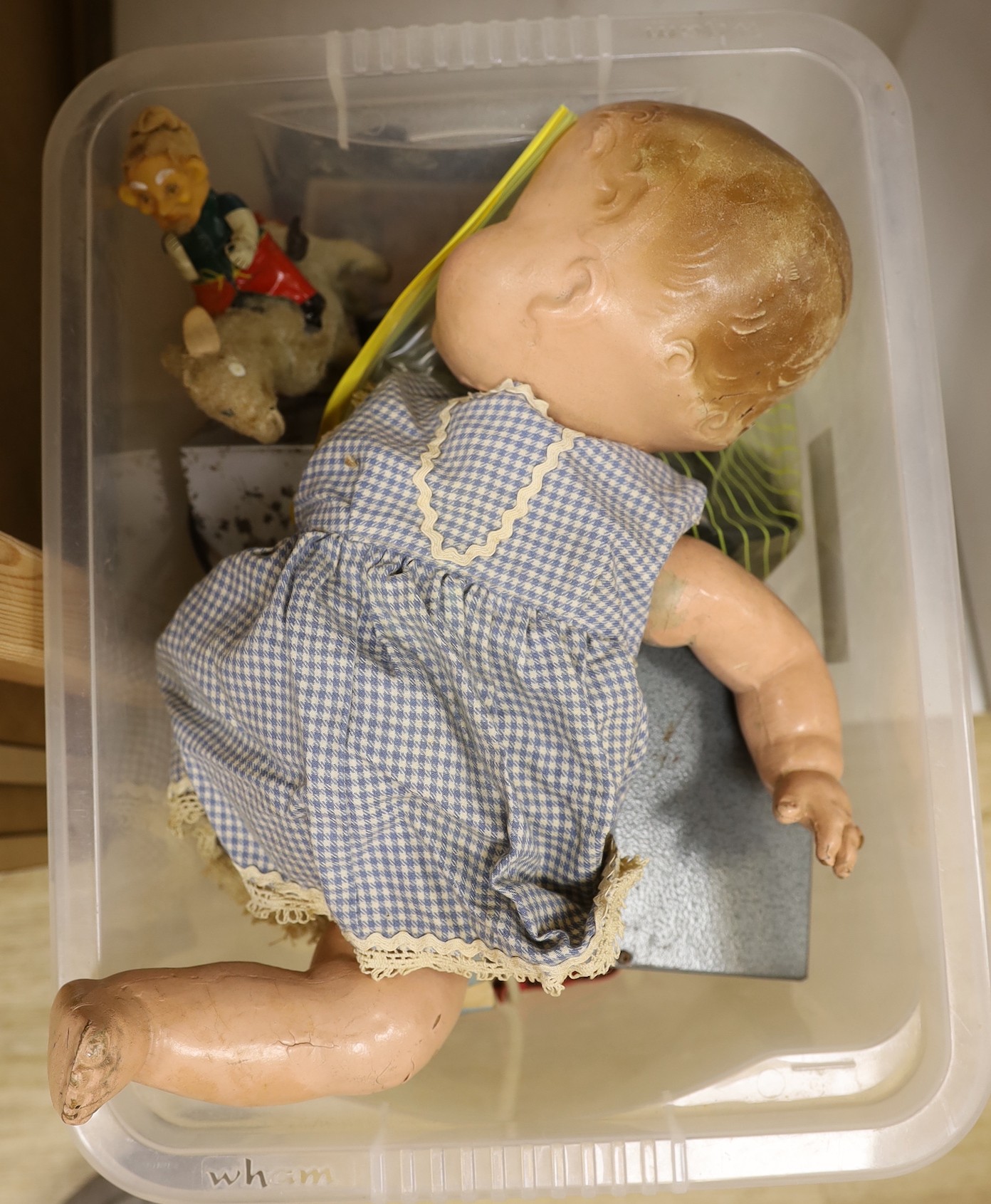 An assortment of miscellaneous boxed toys, two dolls etc